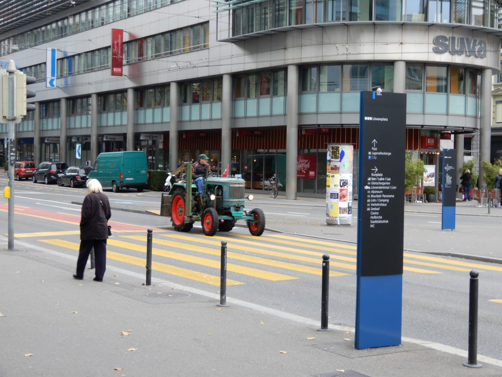 tractor driving down main street