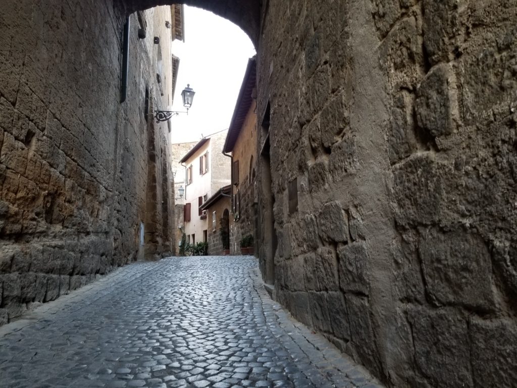 Narrow Orvieto lane with arch in historicl quarter