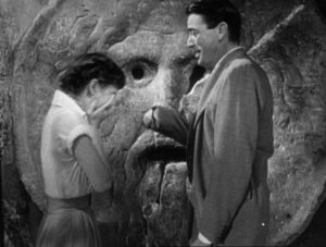 audrey_hepburn_and_gregory_peck_at_the_mouth_of_truth_roman_holiday_trailer1